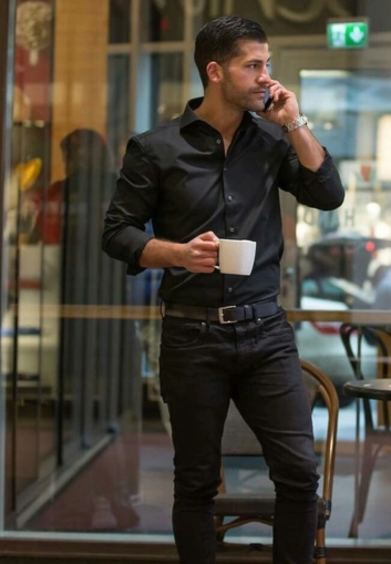 Stylish man in black shirt, black pants