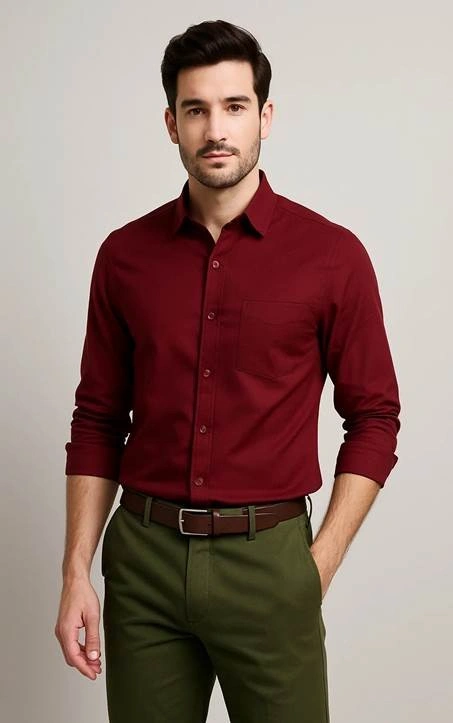Man in maroon green outfit