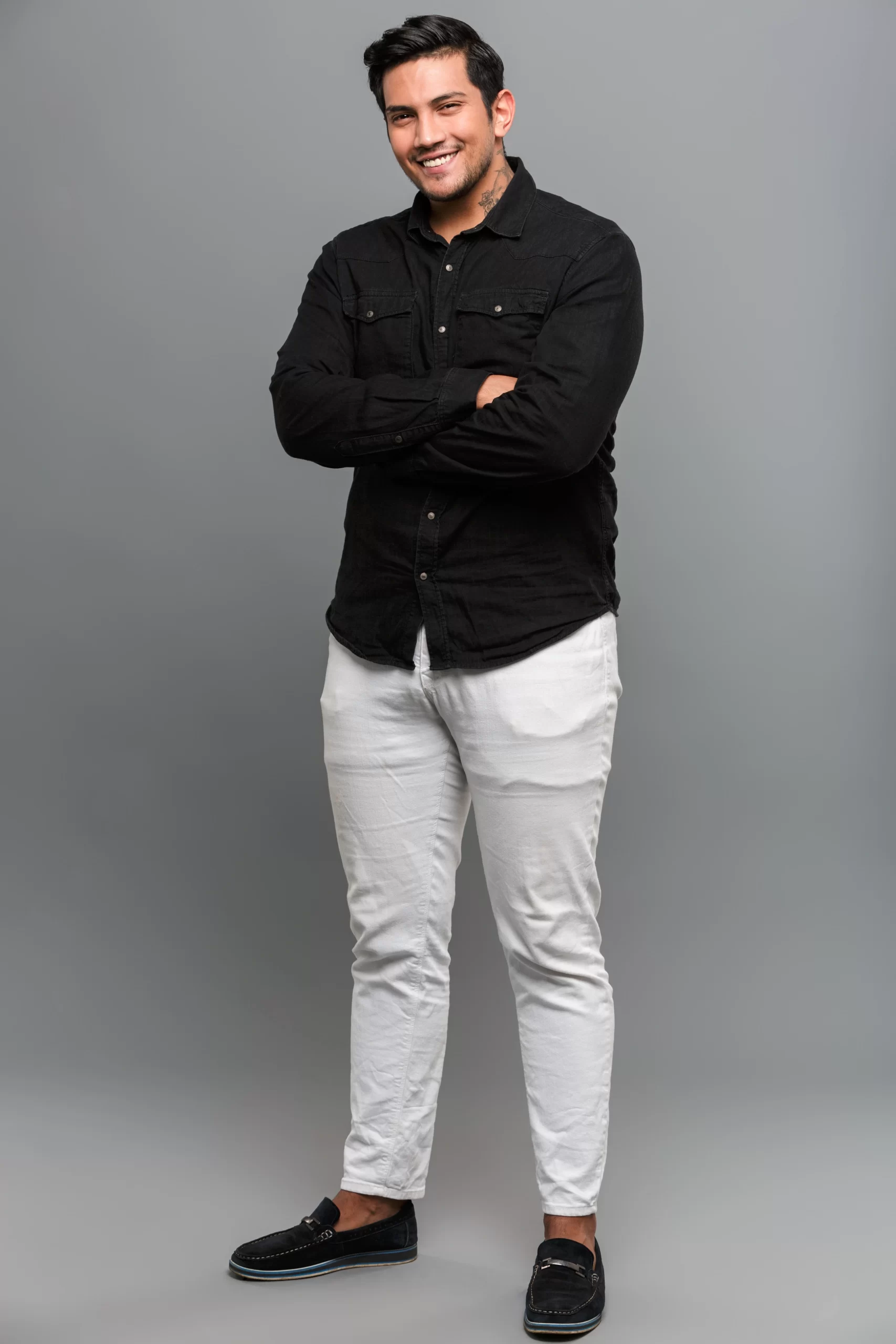  3. Black Shirt White Pant Combination – Modern Minimalist