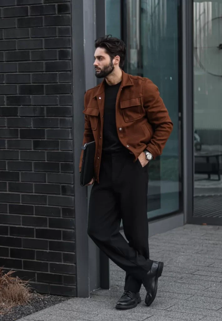 Man wearing brown jacket black outfit