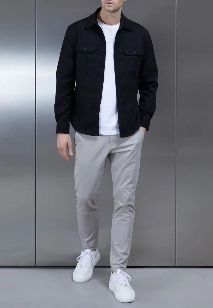 Man wearing black shirt casual outfit