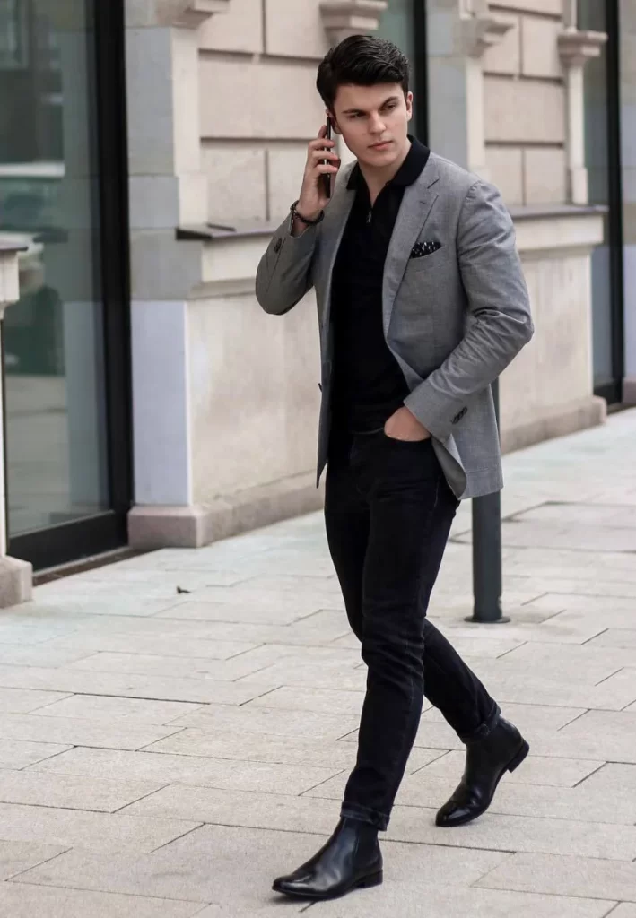Stylish man in grey blazer outfit